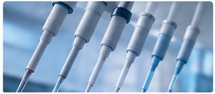 Precision micropipettes illustrating laboratory pipette calibration and measurement accuracy.